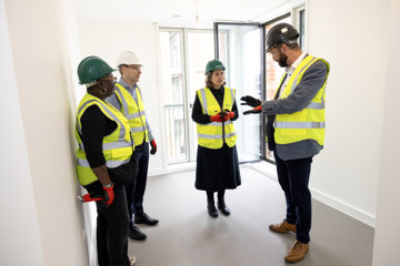 Mayor Touring The Apartments